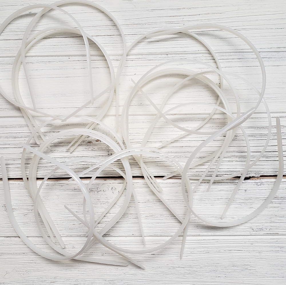 Lot of White Plastic Headbands